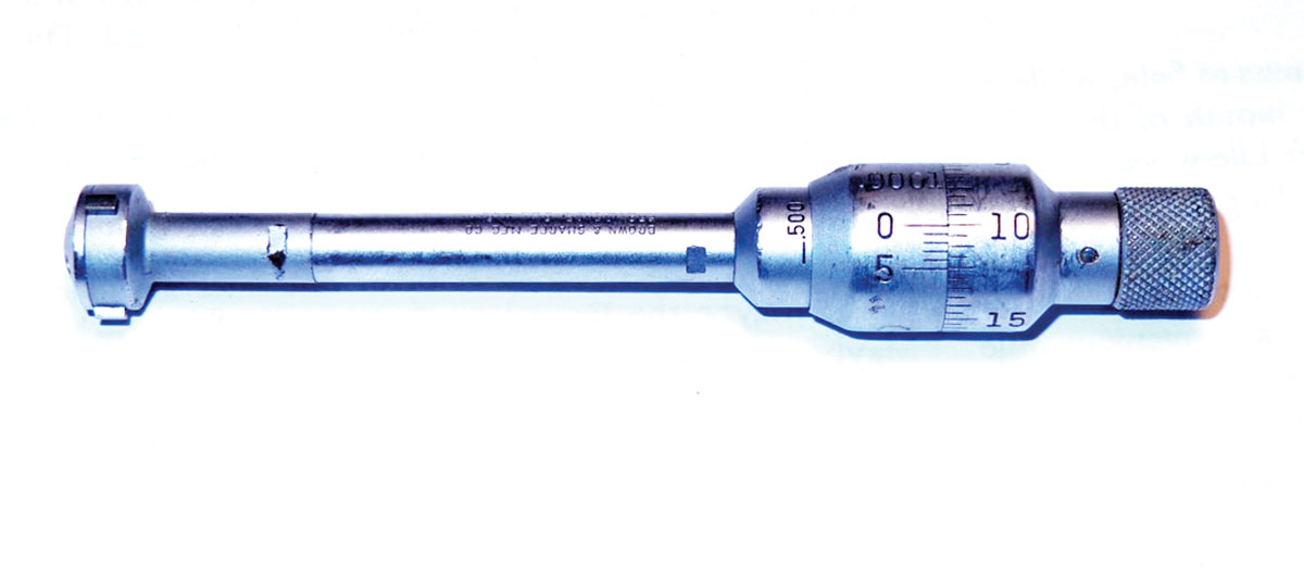 This is the internal micrometer that we used for measuring .45-70 Springfield Trapdoor groove depth. The end to the left is inserted into the muzzle, while the knurled scale on the right provides the groove depth reading. It works on other brands of three-groove barrels as well, within the range of .425 to .500 inch. It can also be used for land-to-land measurements, but there is not as much variation there, because the armory used .450-inch plug gauges.